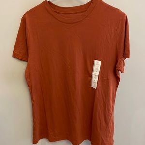 Woman’s tee/ Rust color/ size M/NWOT